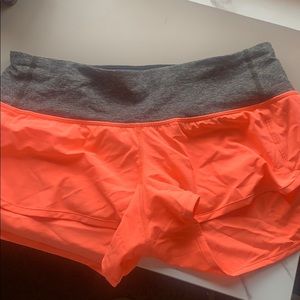 Neon coral and grey lulu lemon shorts